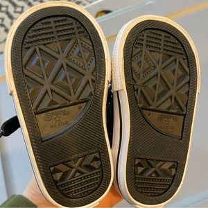 Converse baby/toddler size 4 slip in shoe, black leather. Never worn.